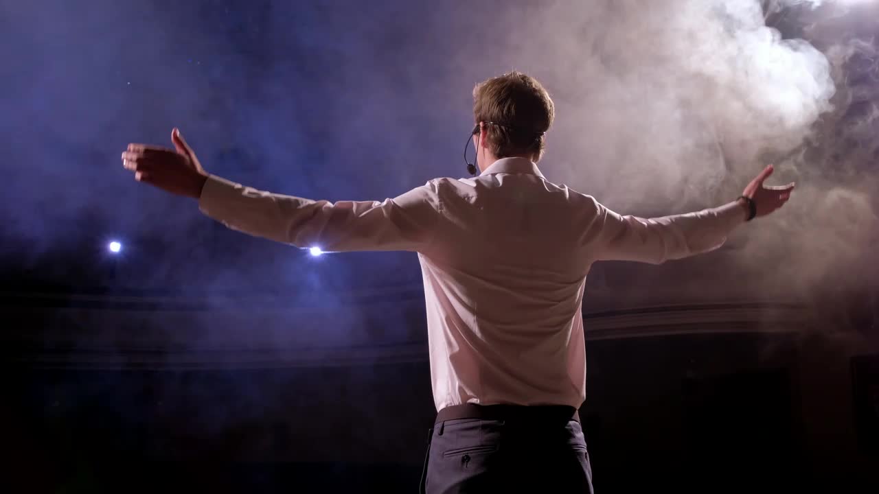 Free Video Stock Successful Speaker Finishing A Presentation Live Wallpaper