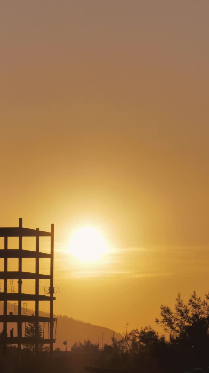 Free Video Stock Sun Hiding Between Hills On The Horizon Live Wallpaper