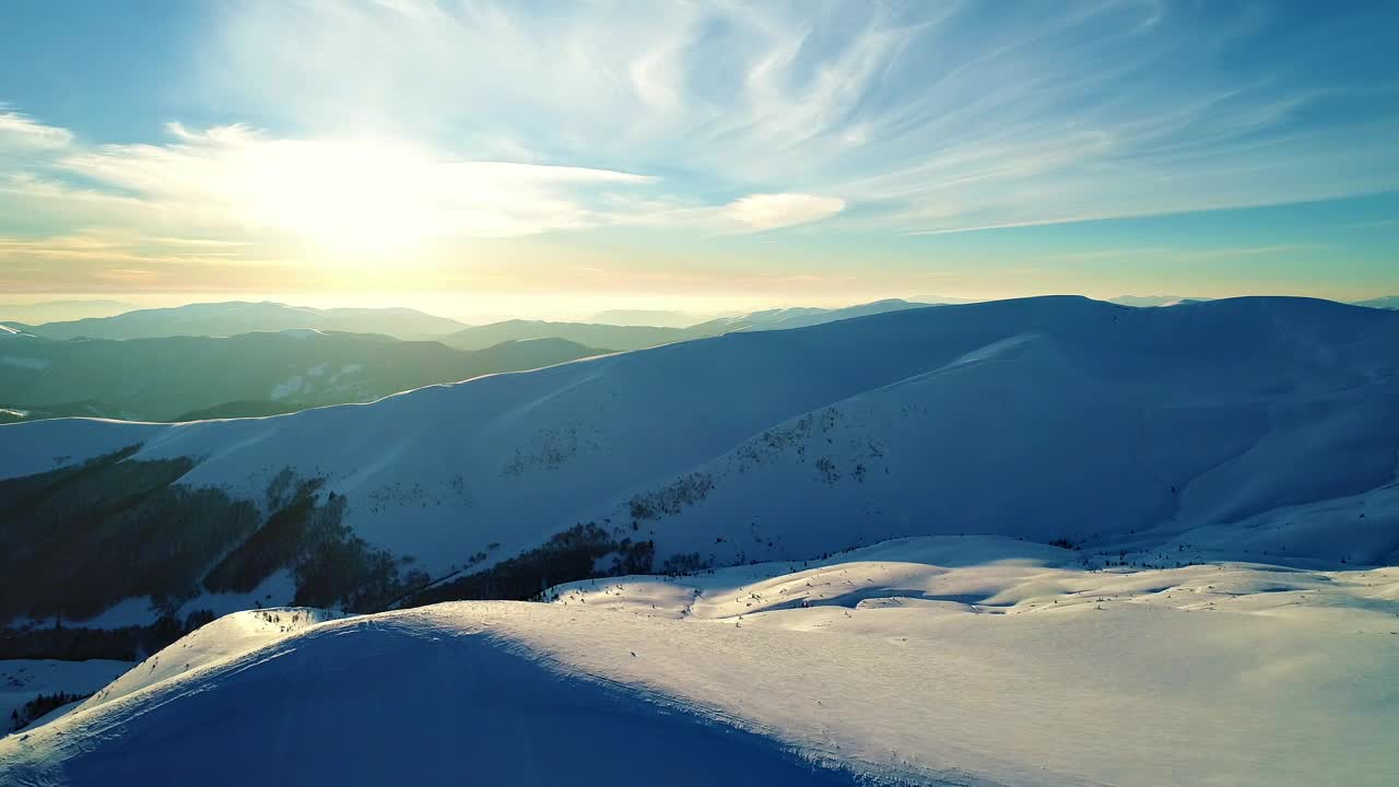 Free Video Stock Sun Illuminating The Snowy Relief Of The Mountains Live Wallpaper