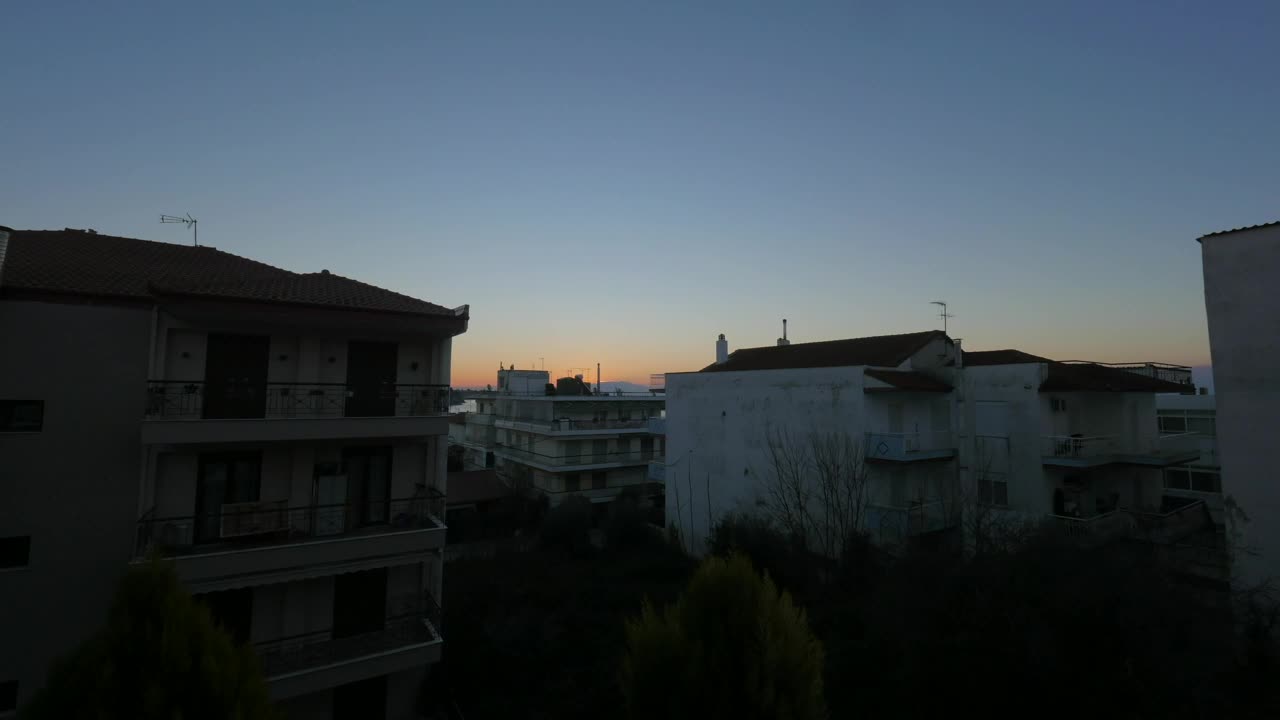 Free Video Stock Sun Rising Above A Small Town Live Wallpaper