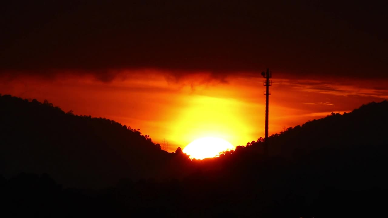Free Video Stock Sun Rising Towards Dark Clouds Live Wallpaper