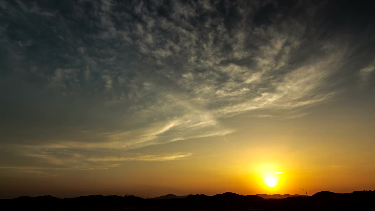 Free Video Stock Sun Setting Across Dark Hills Live Wallpaper