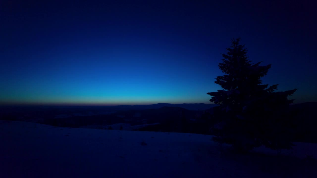 Free Video Stock Sunrise From A Snowy Hill With Pine Trees Live Wallpaper