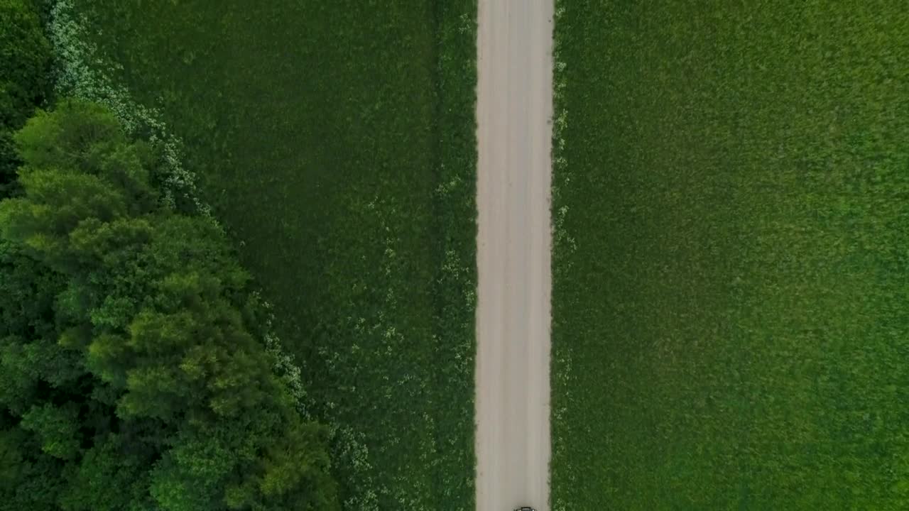 Free Video Stock transport truck on a road in the green countryside Live Wallpaper