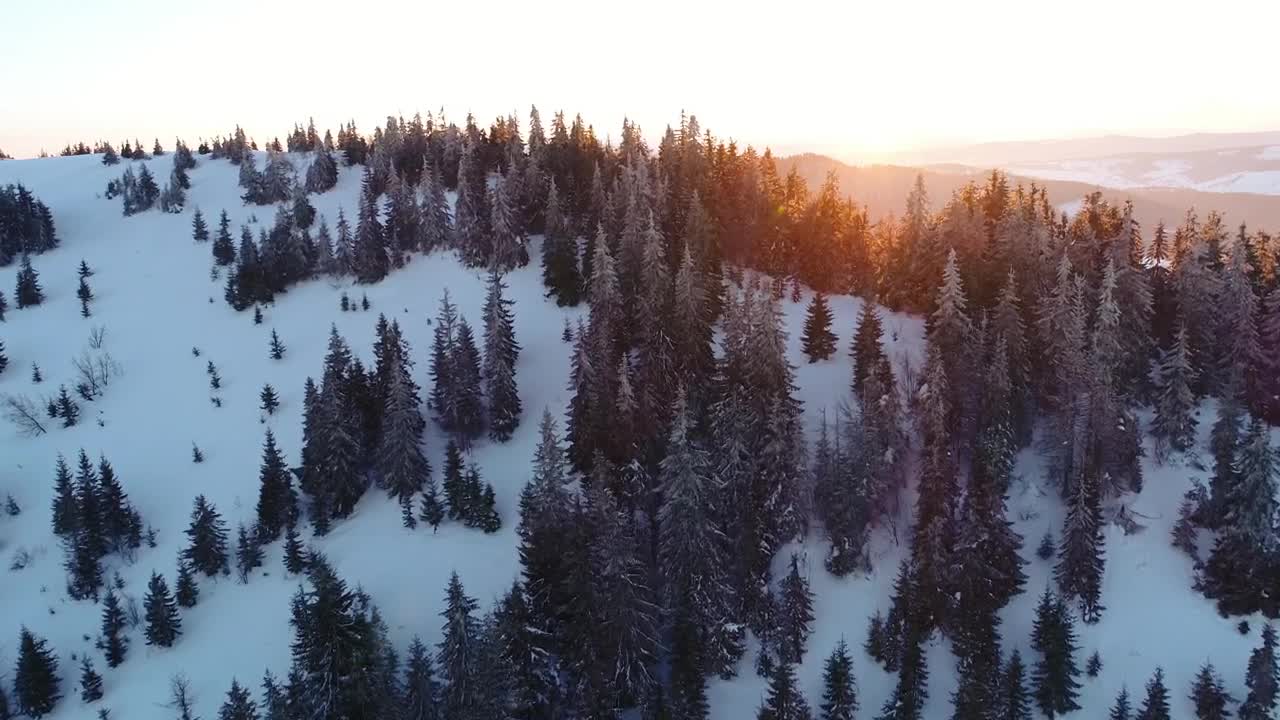 Free Video Stock sunrise in the skyline at snowy mountains Live Wallpaper