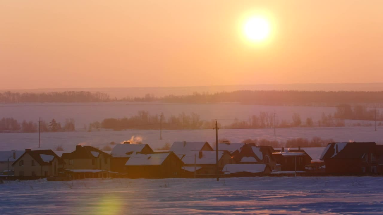 Free Video Stock sunrise over a snowy town landscape Live Wallpaper