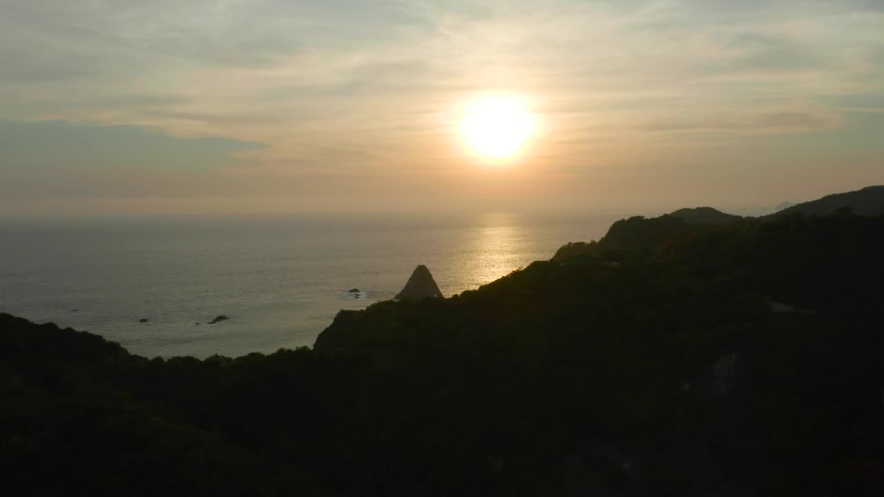 Free Video Stock sunset at sea seen from the top of a coast Live Wallpaper