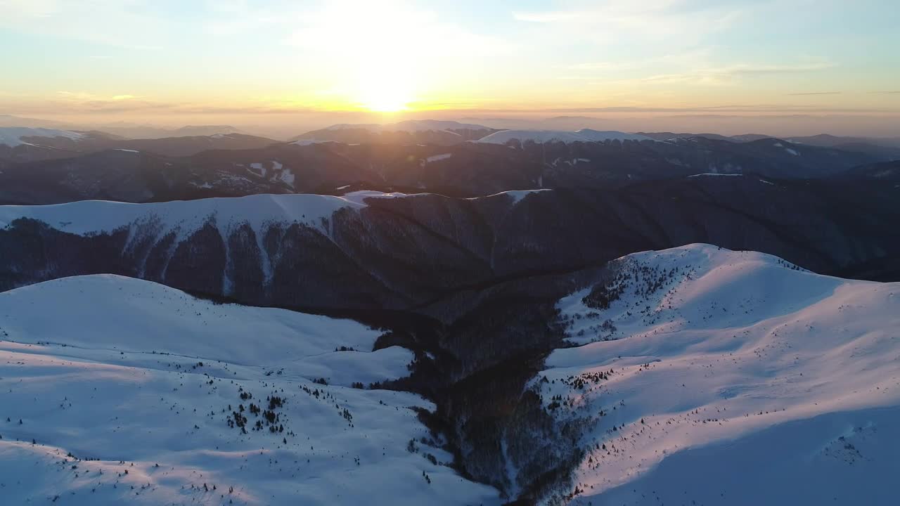 Free Video Stock sunset covering a winter landscape Live Wallpaper