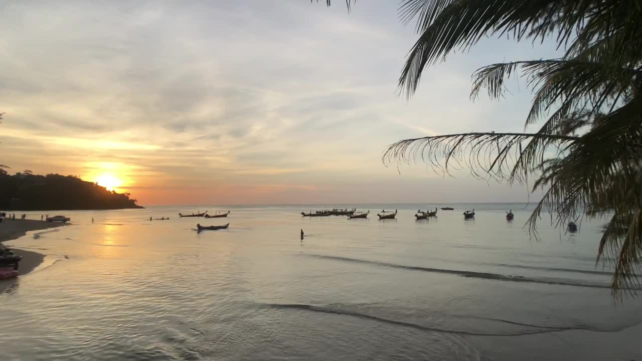 Free Video Stock sunset in a calm beach Live Wallpaper