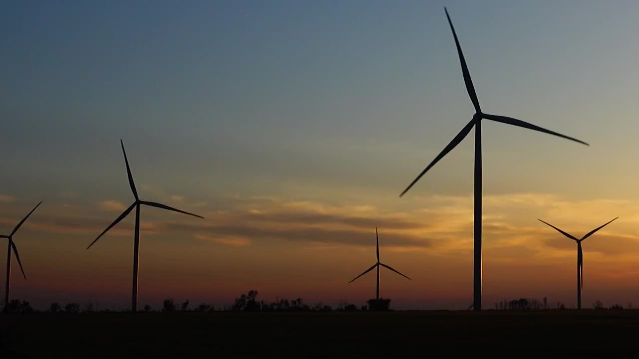 Free Video Stock sunset in the countryside with wind turbines working Live Wallpaper