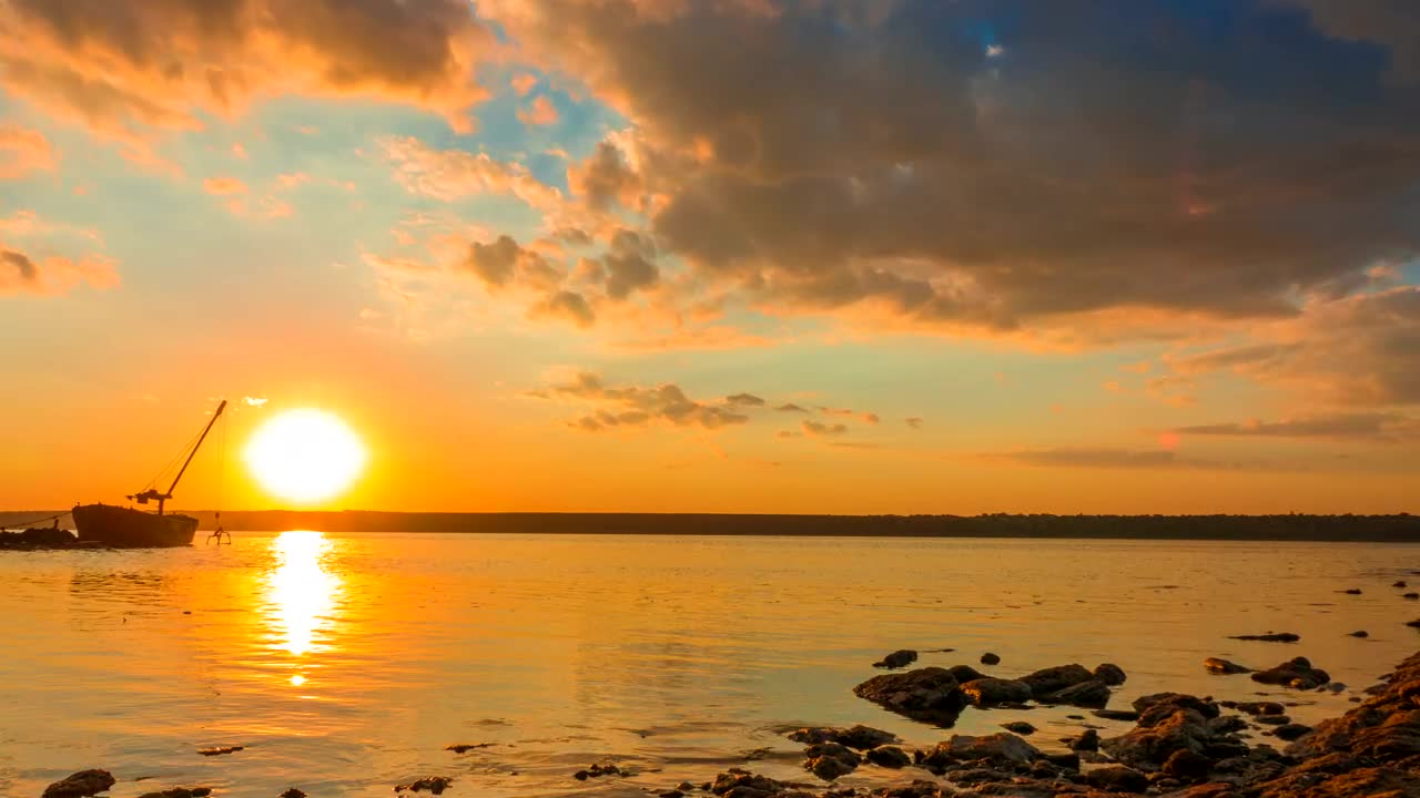 Free Video Stock sunset in the river with a boat Live Wallpaper