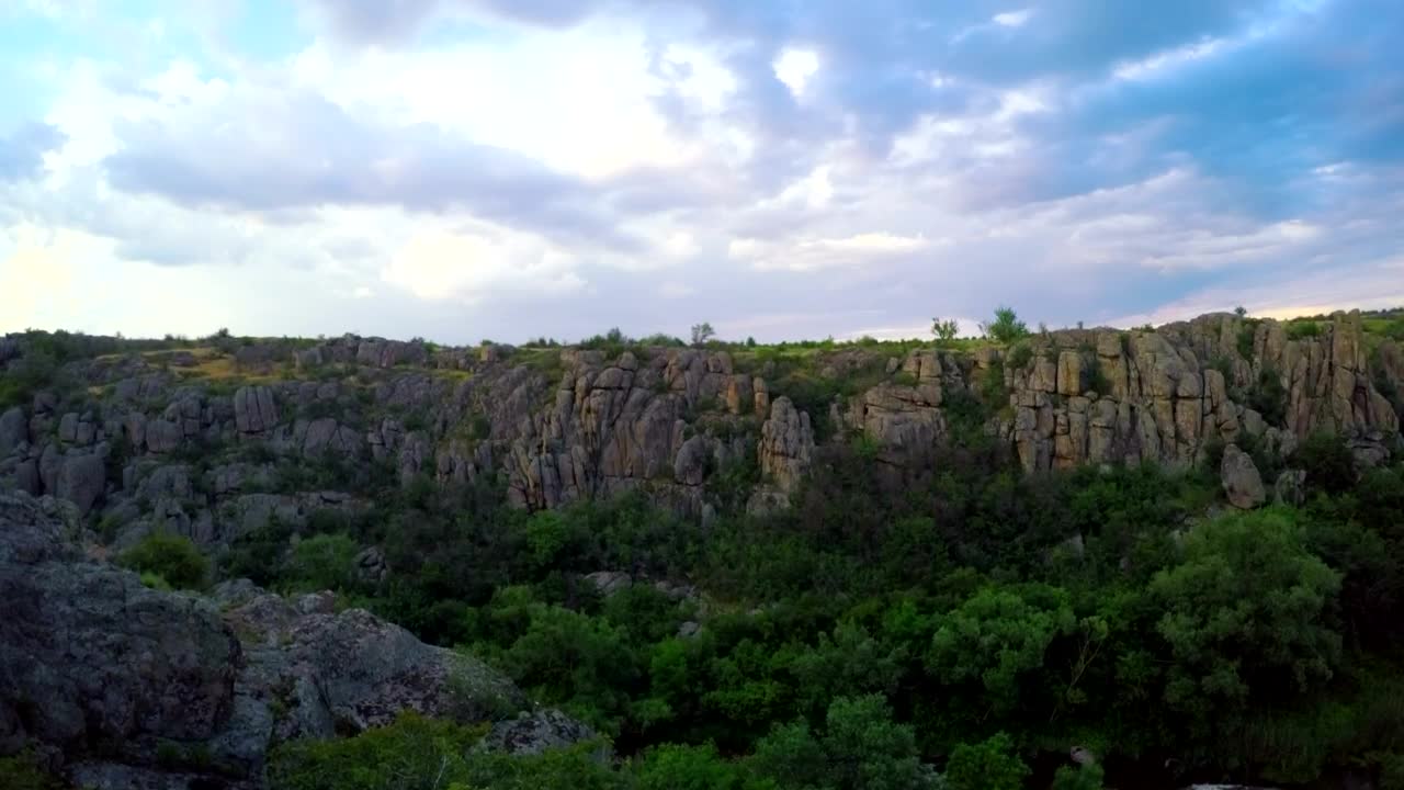 Free Video Stock sunset over a canyon with a rainbow Live Wallpaper