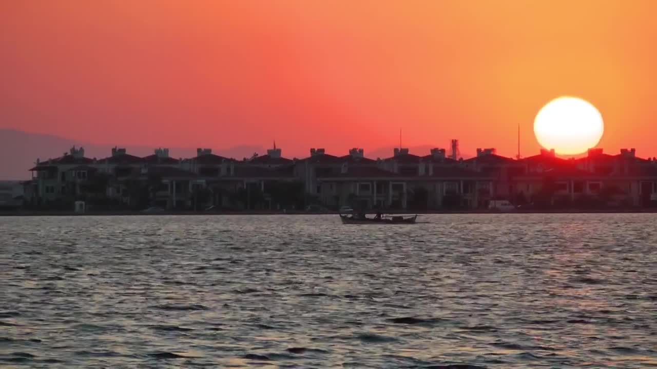 Free Video Stock sunset seen from a sailing ship Live Wallpaper