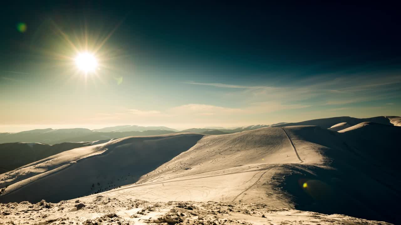 Free Video Stock sunset seen from the mountains in winter Live Wallpaper