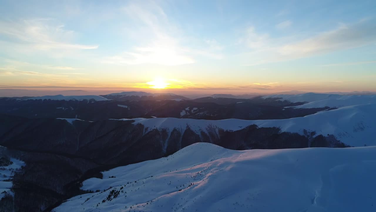 Free Video Stock sunset seen from the winter mountains Live Wallpaper