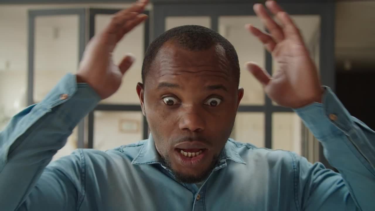 Free Video Stock surprised man with hands on head Live Wallpaper