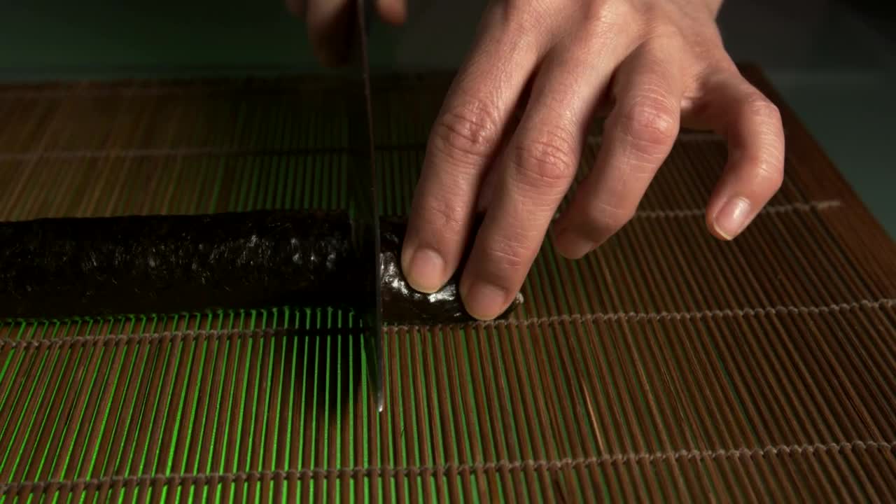 Free Video Stock sushi chef preparing a roll of sushi Live Wallpaper