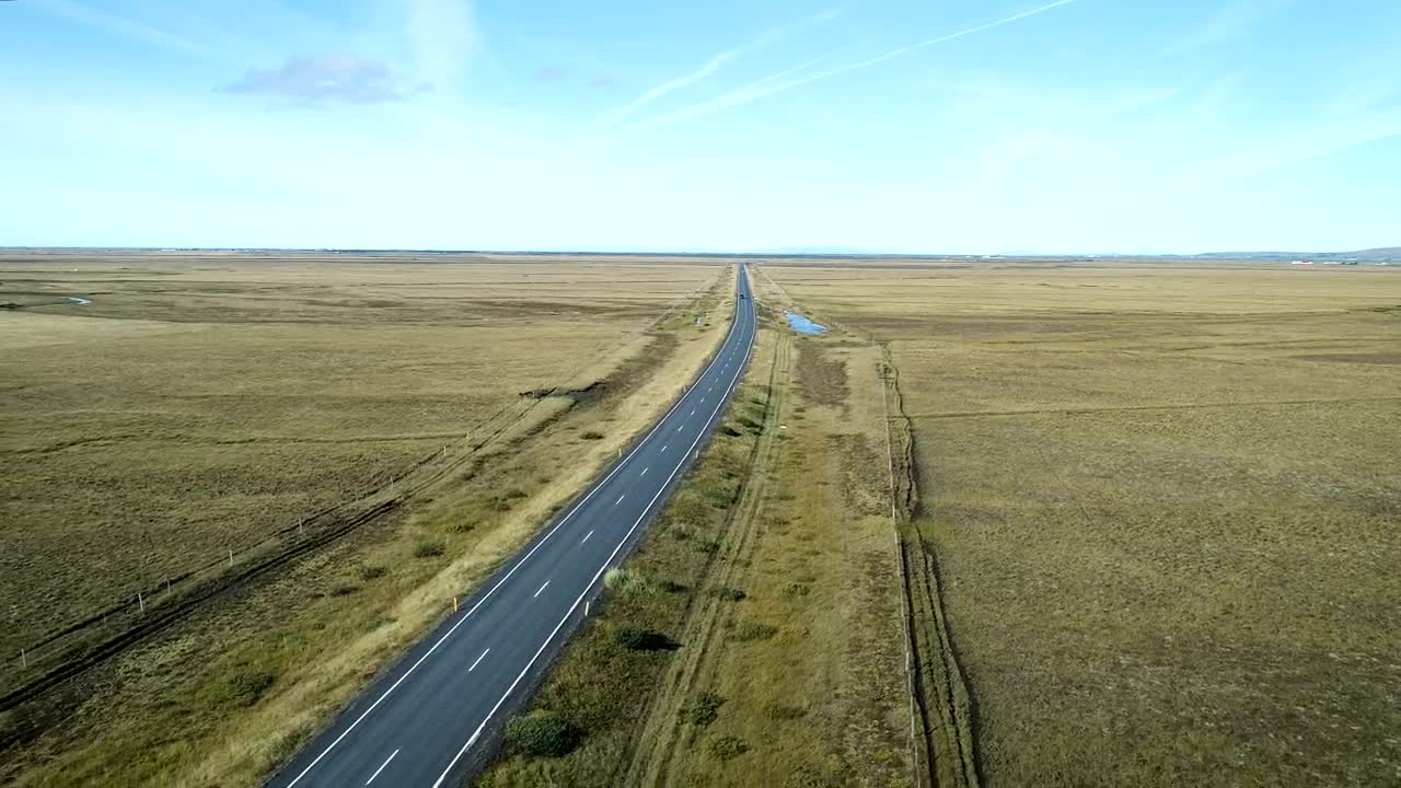 Free Video Stock suv on an empty road in the countryside Live Wallpaper