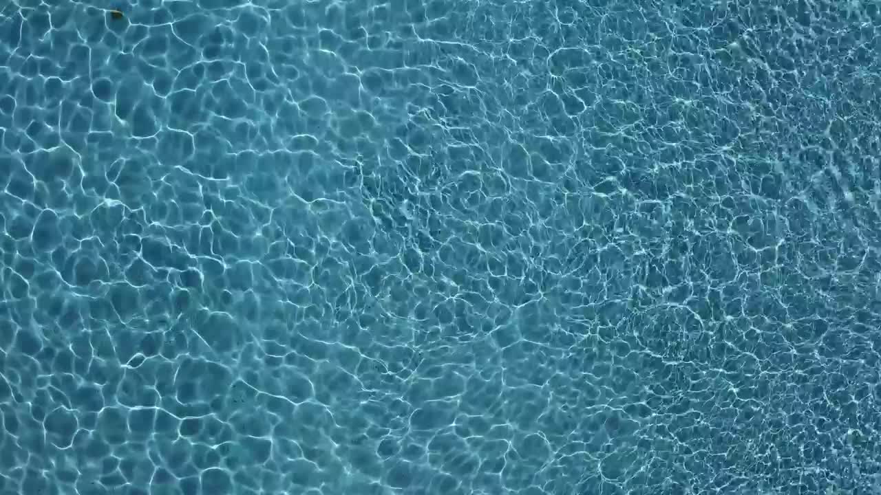 Free Video Stock swimming pool water top aerial shot Live Wallpaper