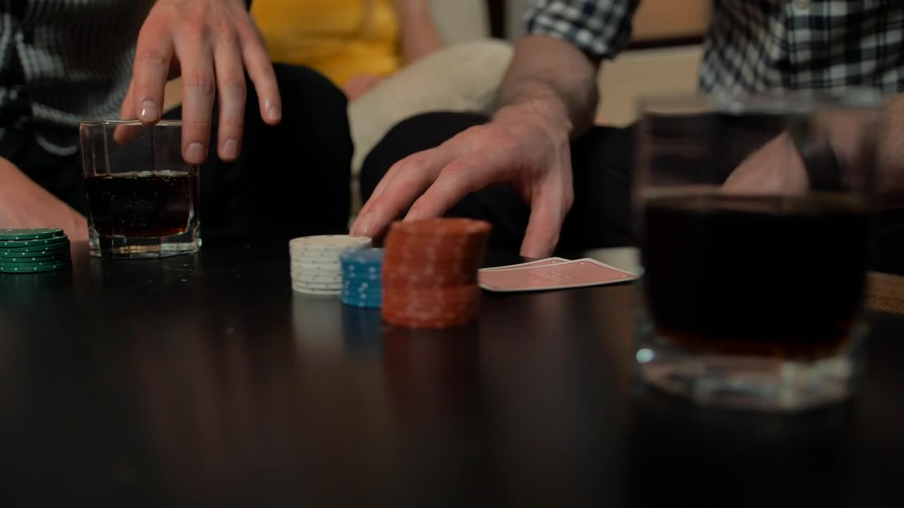 Free Video Stock table while young people play poker Live Wallpaper