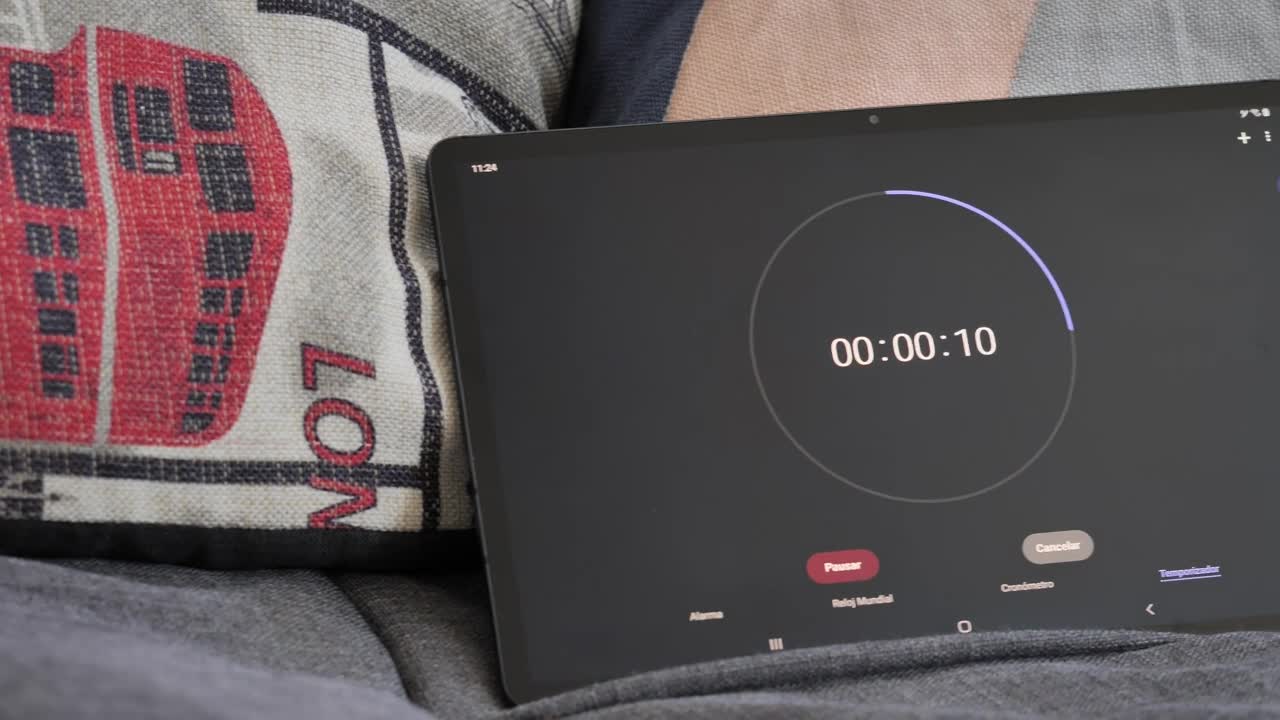 Free Video Stock tablet on a sofa running a timer Live Wallpaper