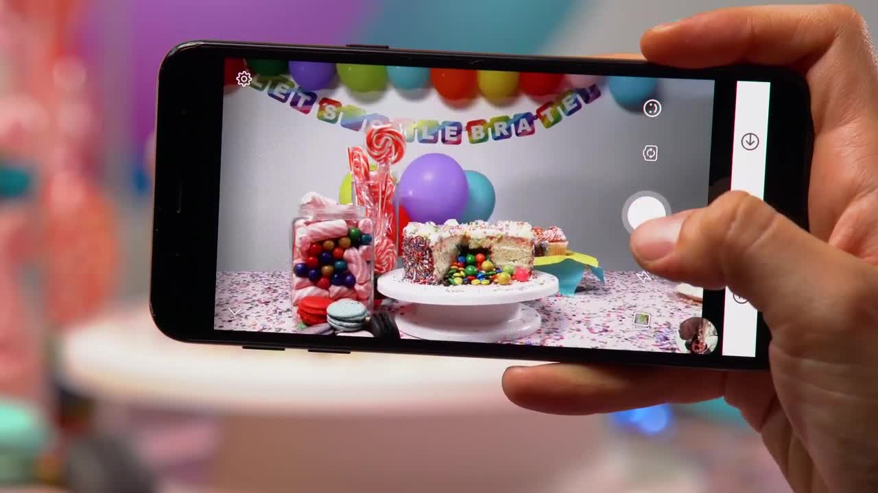 Free Video Stock taking a picture of a birthday table with a smartphone Live Wallpaper