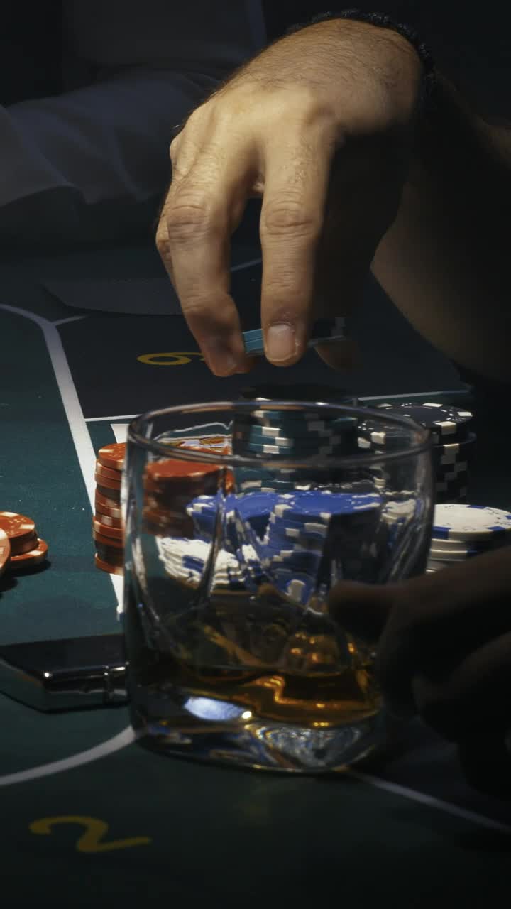 Free Video Stock taking casino chips to bet during a game Live Wallpaper