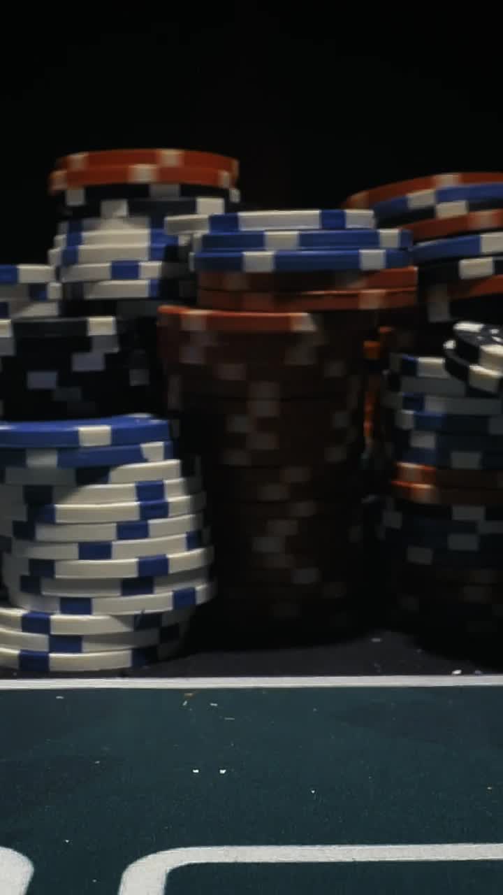 Free Video Stock taking down a tower of poker chips Live Wallpaper