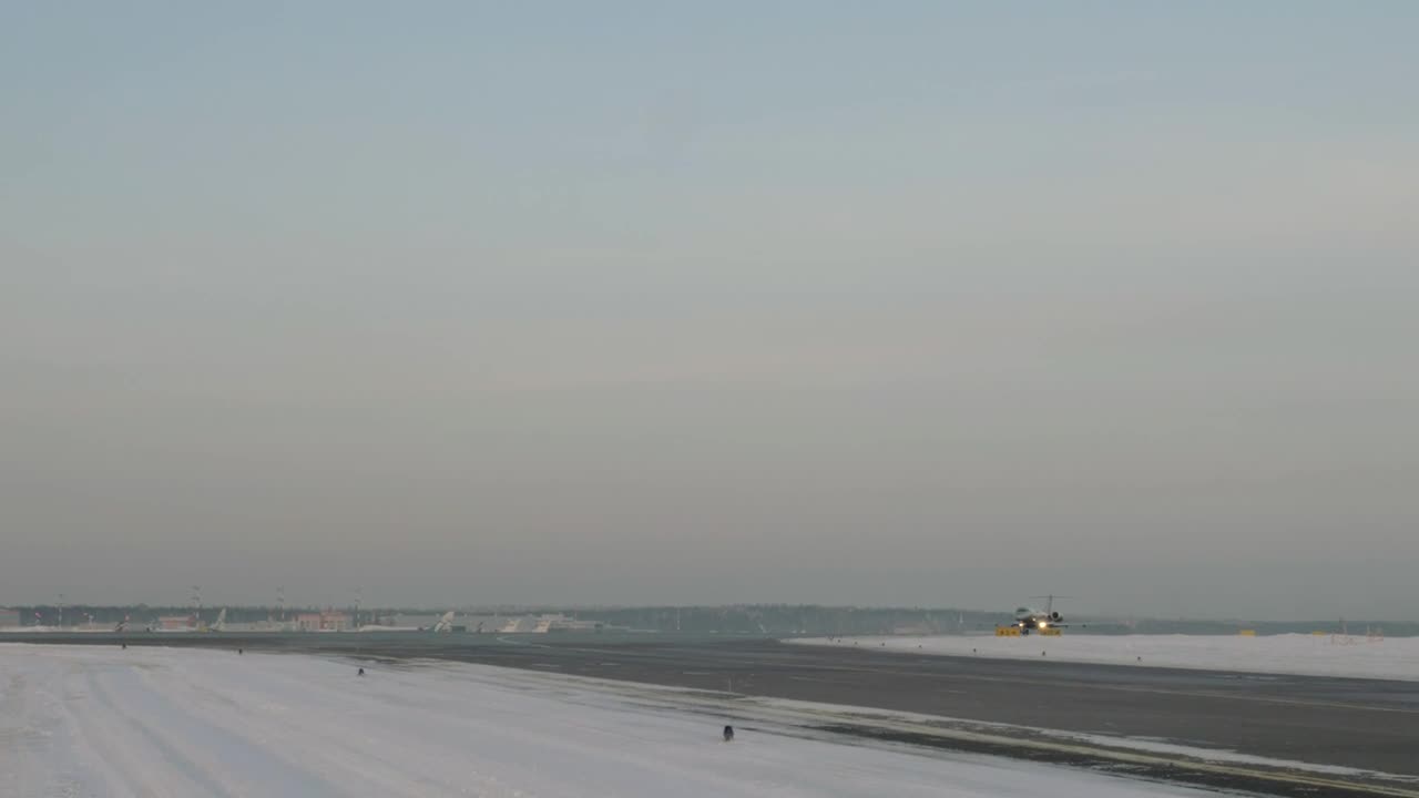 Free Video Stock taking off from a snowy airfield Live Wallpaper