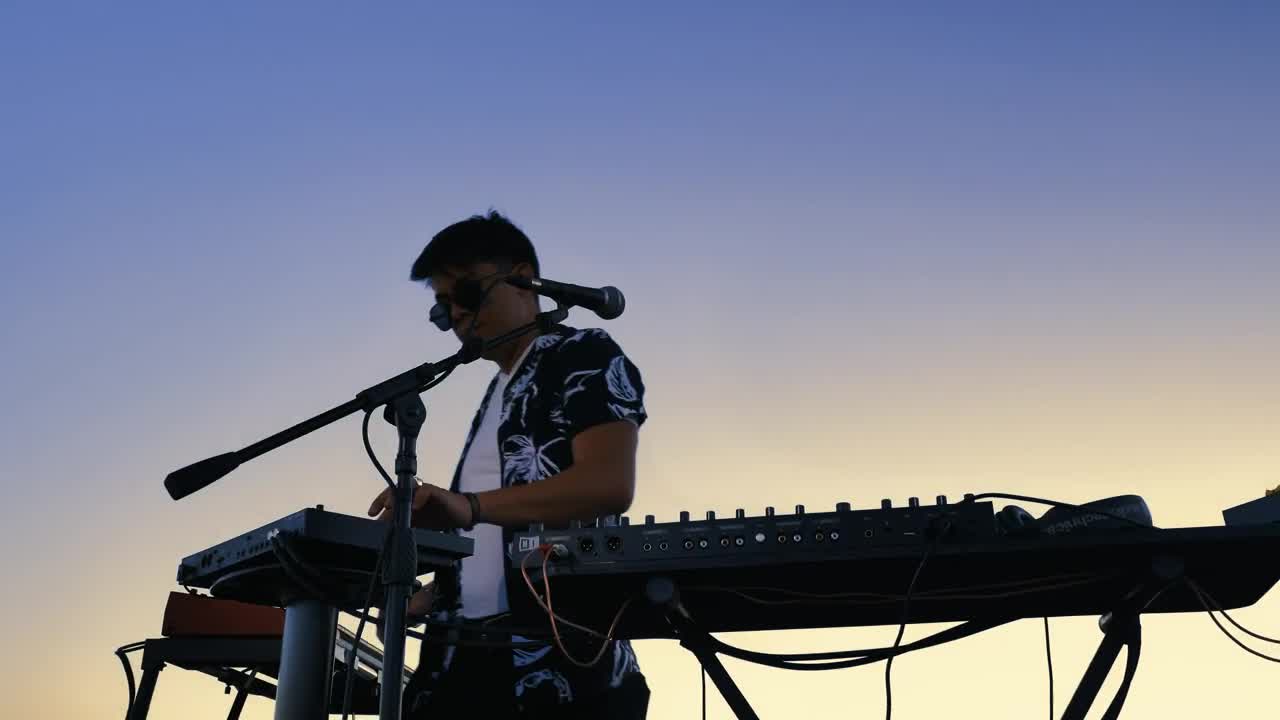 Free Video Stock talented dj mixing music in nature Live Wallpaper