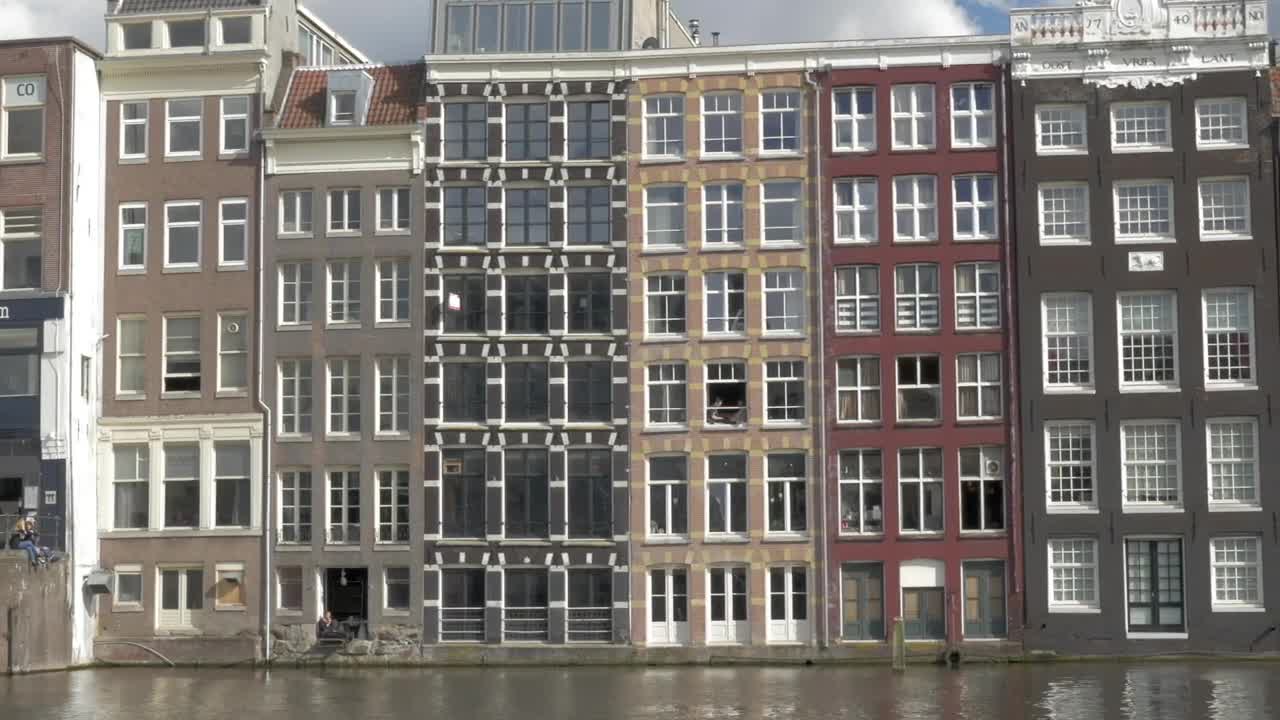 Free Video Stock tall houses along a river Live Wallpaper