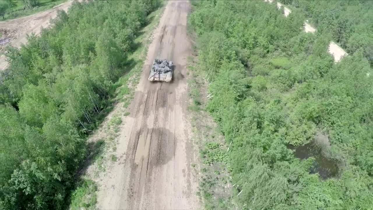 Free Video Stock tank driving over rough terrain Live Wallpaper