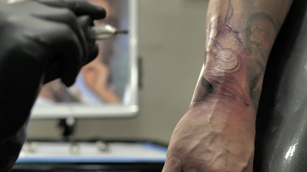 Free Video Stock tattooing a forearm Live Wallpaper