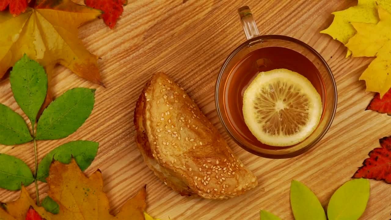 Free Video Stock tea and snack rotating on the table Live Wallpaper