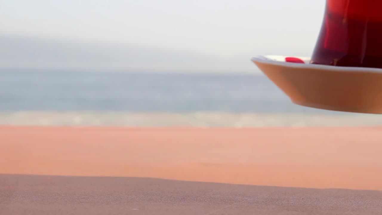 Free Video Stock tea glass near the beach Live Wallpaper