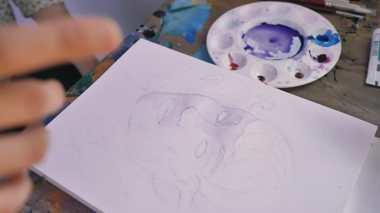 Free Video Stock teacher advising a painting student Live Wallpaper