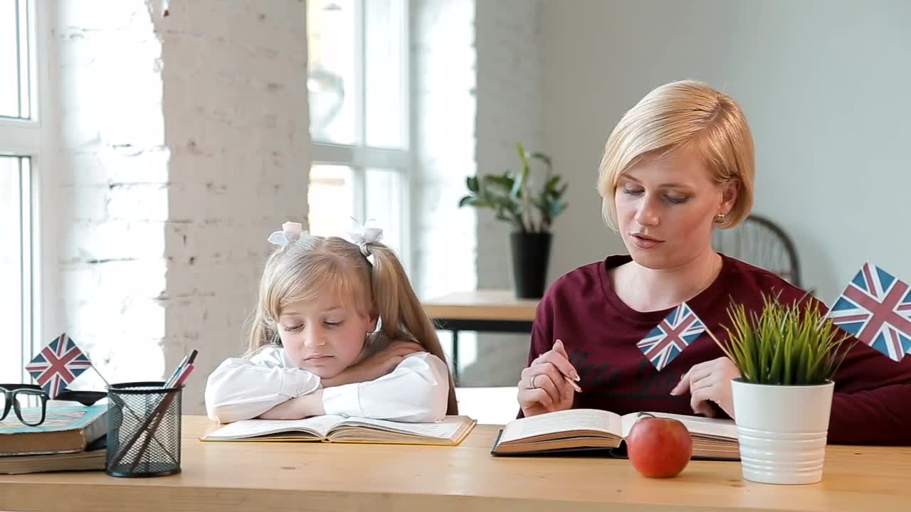 Free Video Stock teacher gets little girl interested in learning Live Wallpaper