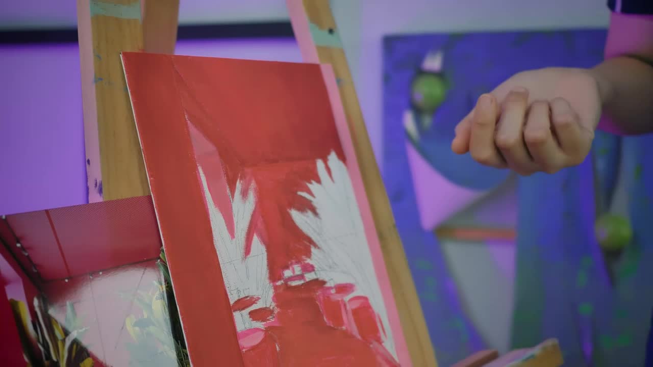 Free Video Stock teacher helping a student to paint Live Wallpaper