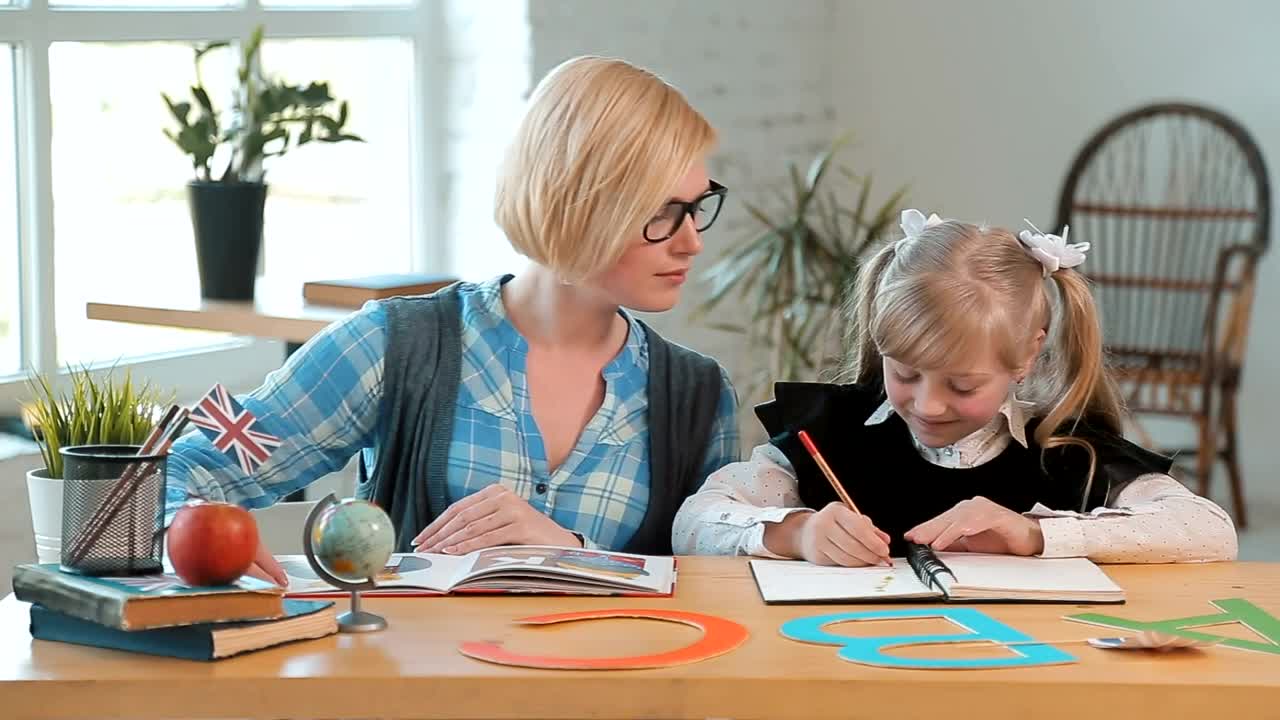 Free Video Stock teacher praises young student for a job well done Live Wallpaper