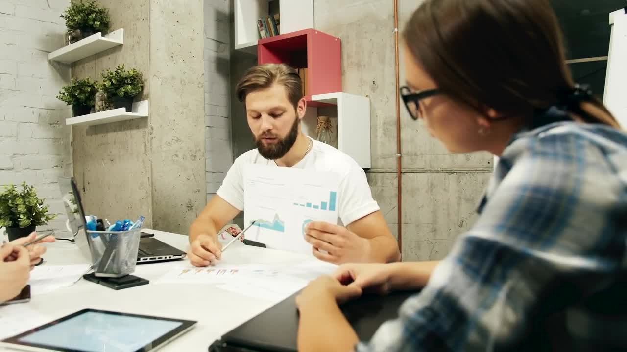 Free Video Stock team celebrates winning project results at meeting Live Wallpaper