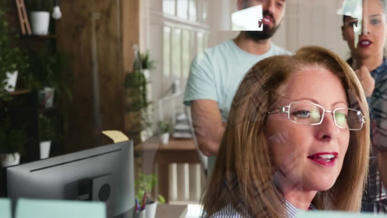 Free Video Stock team collaborates on idea with notes on window Live Wallpaper