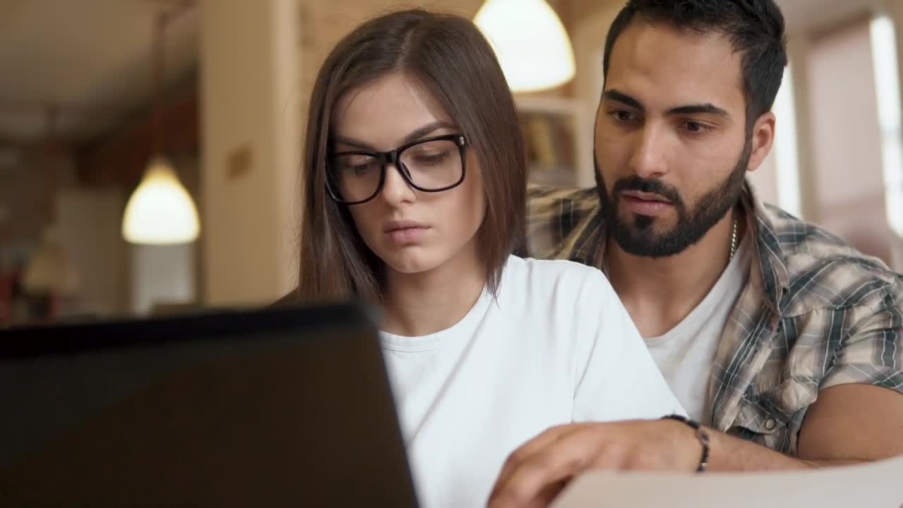 Free Video Stock team leader helps coworker solve problem Live Wallpaper