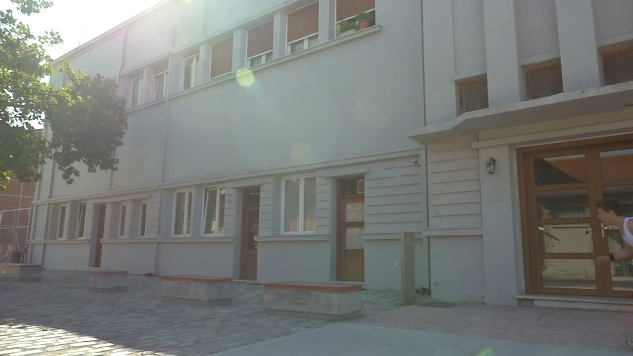 Free Video Stock teenager doing parkour down a street Live Wallpaper