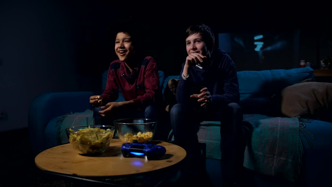 Free Video Stock teens watching a funny film together Live Wallpaper