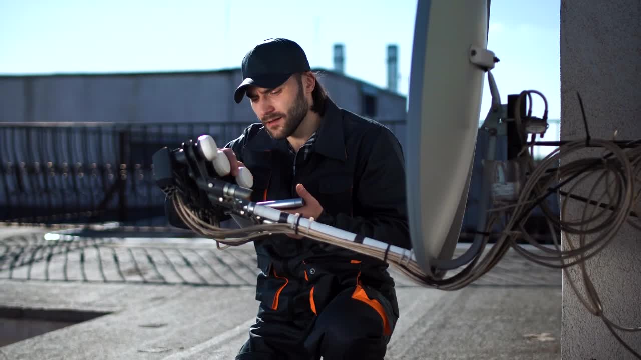 Free Video Stock television technician checking the antenna Live Wallpaper