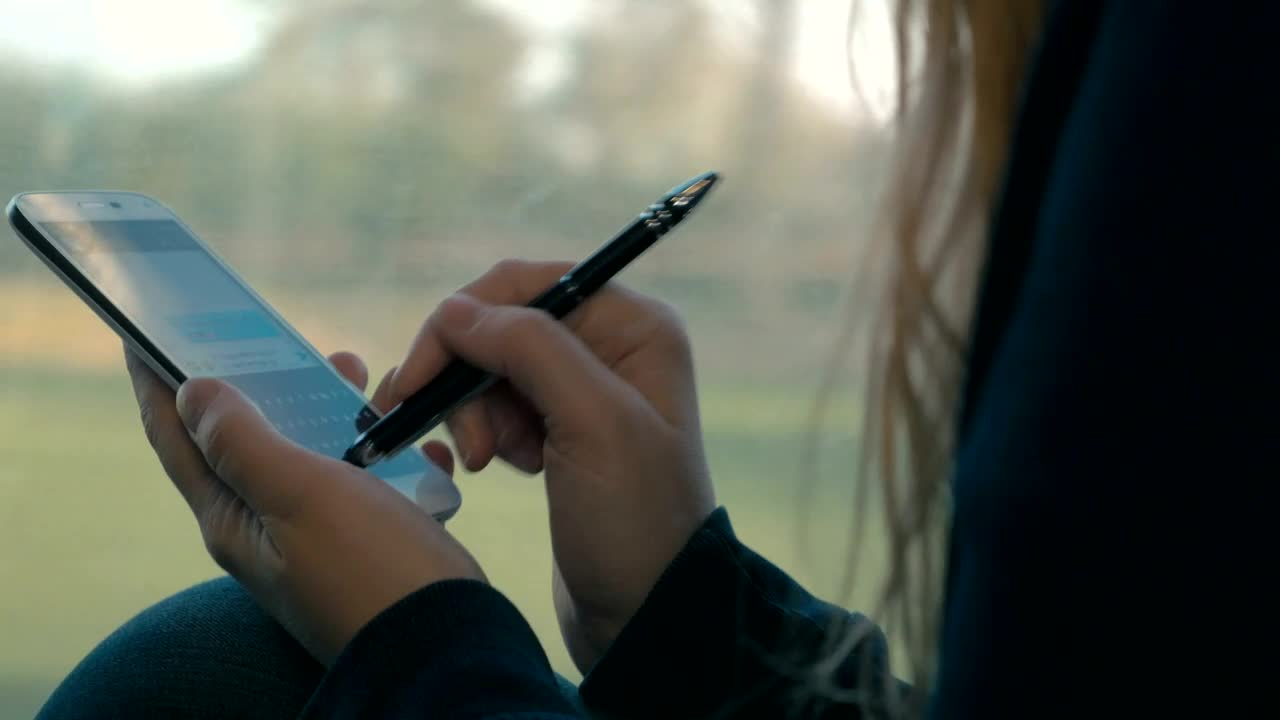 Free Video Stock texting while riding a train Live Wallpaper