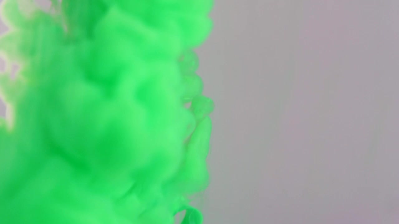Free Video Stock texture of a cloud of green ink entering water Live Wallpaper