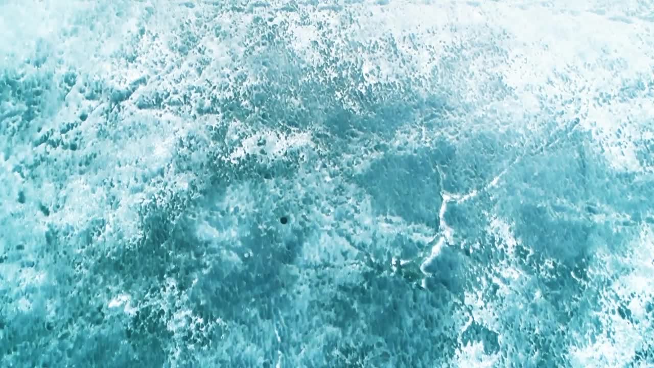 Free Video Stock texture of a frozen lake aerial shot Live Wallpaper