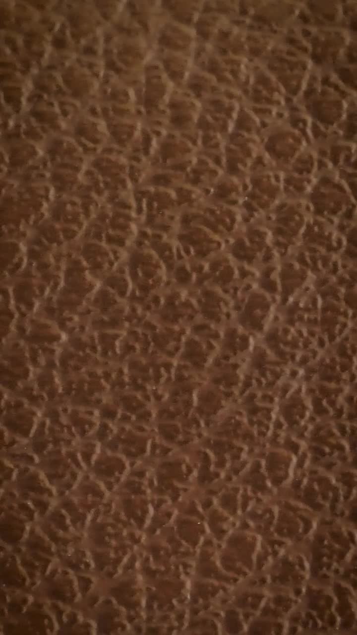 Free Video Stock texture of a leather surface close view Live Wallpaper
