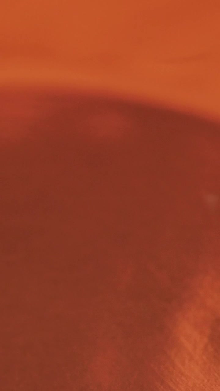 Free Video Stock texture of a waving orange liquid Live Wallpaper